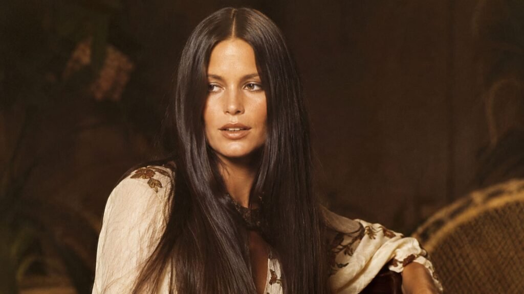 Woman with long straight 70s hair and a center part