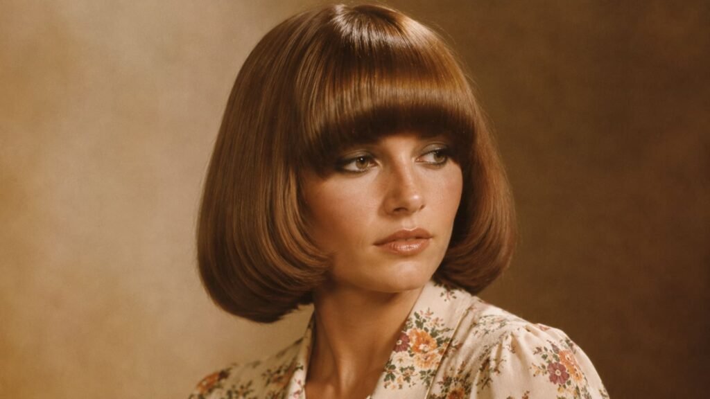 Woman with a smooth pageboy hairstyle in 1970s style