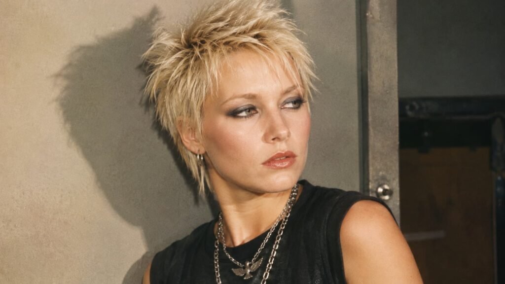 Woman with a punk-inspired cropped 70s hairstyle