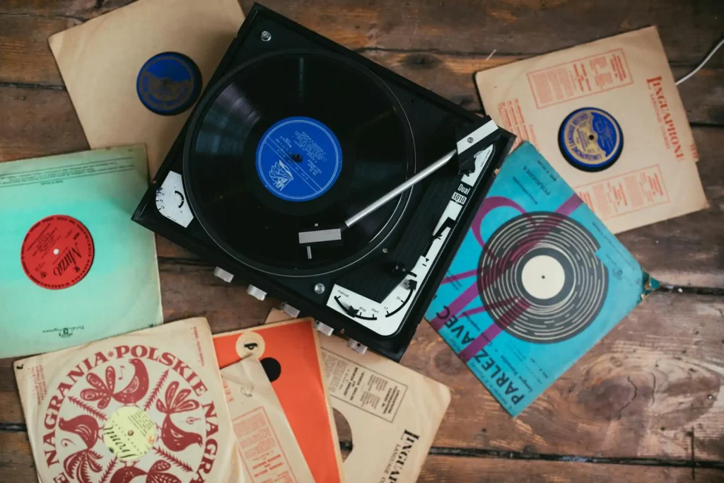 This is an image of a vinyl player and some lp's