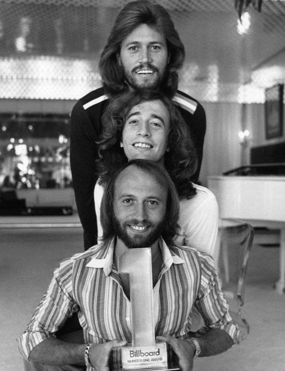 this is a group photo of the bee gees from 1977